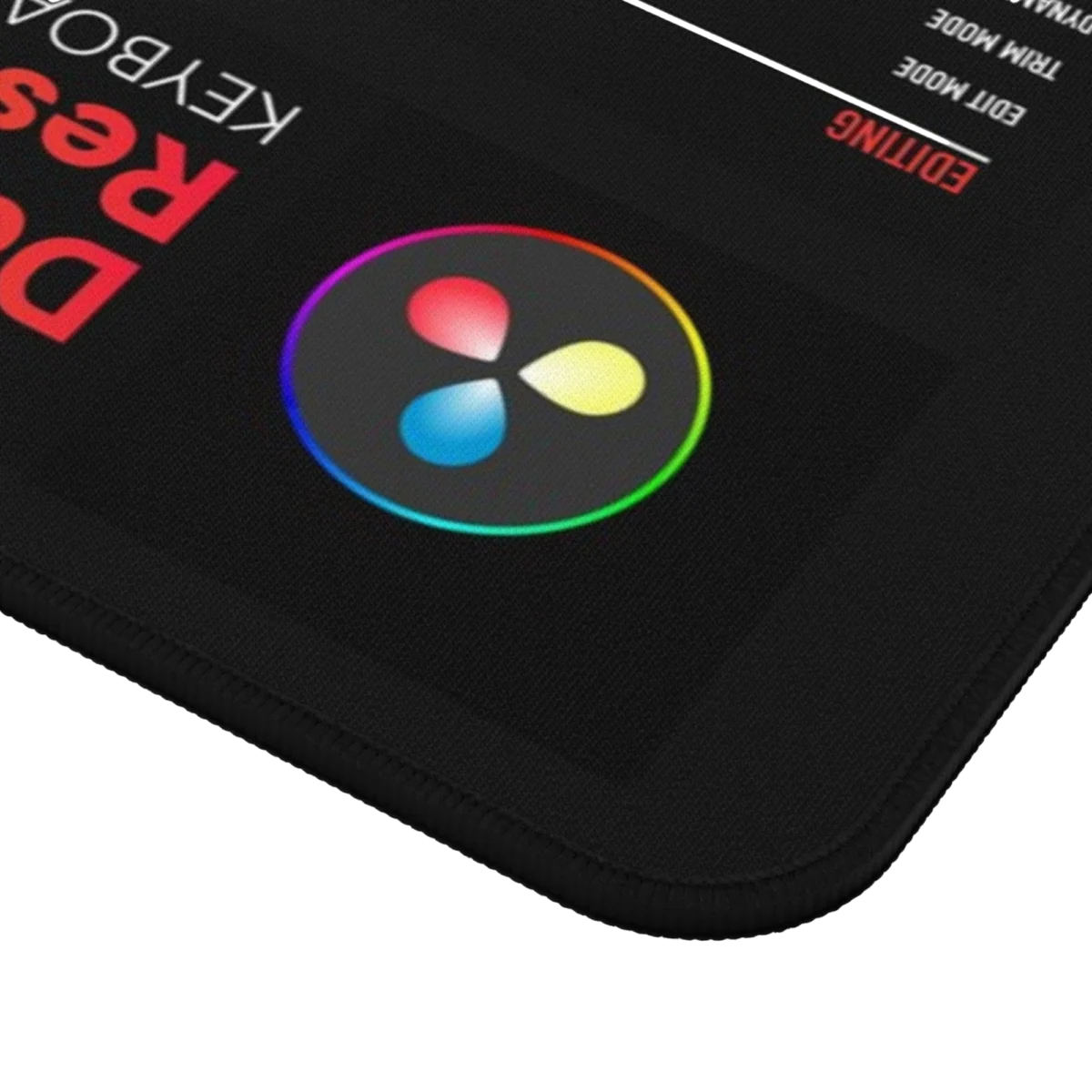 DaVinci Resolve keyboard mat with post production shortcuts, Fusion key guide, and Blackmagic video editing workflow reference.